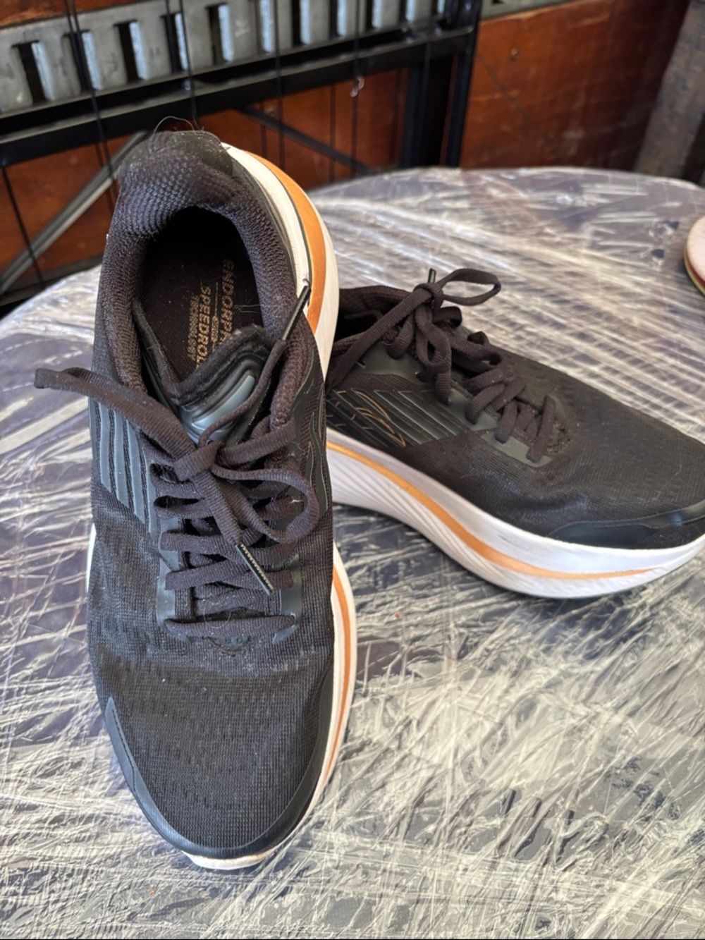 Saucony Men's Black Running Shoes with Orange Stripe